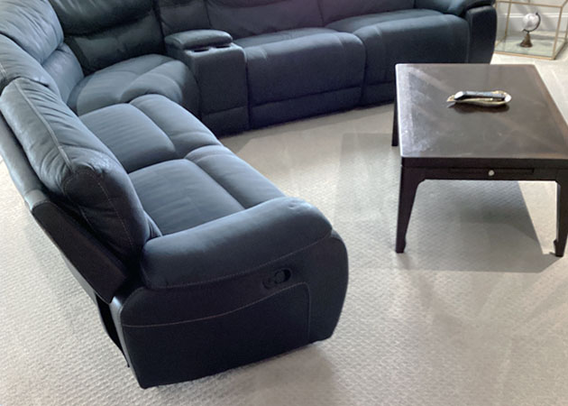A sofa and coffee table in a living room